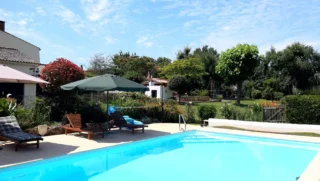 Swimming pool at La Petite Guyonnière View of swimming pool at La Petite Guyonnière